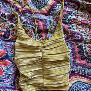 a yellow tank top, from urban outfitters
